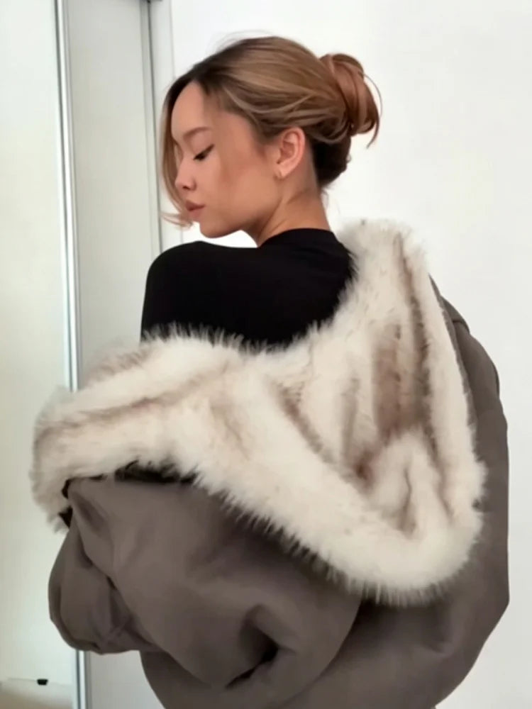 Back view of the beige reversible hooded jacket