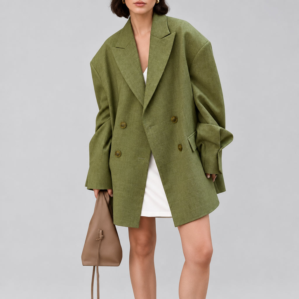The Verona Blazer in green
The Verona Blazer in black
Women's oversized double-breasted blazer
The Verona Blazer with notched lapel
Green oversized women's blazer
Black oversized women's blazer
Women's blazer with drop shoulders and patch pockets
The Verona Blazer styled with denim
The Verona Blazer styled with trousers
Women's double-breasted blazer streetwear outfit