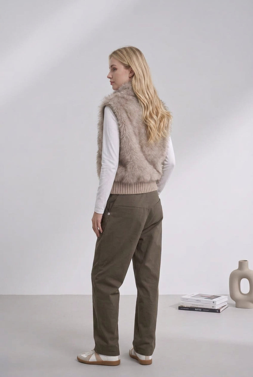 Short faux fur outerwear styled for cool-weather outfits