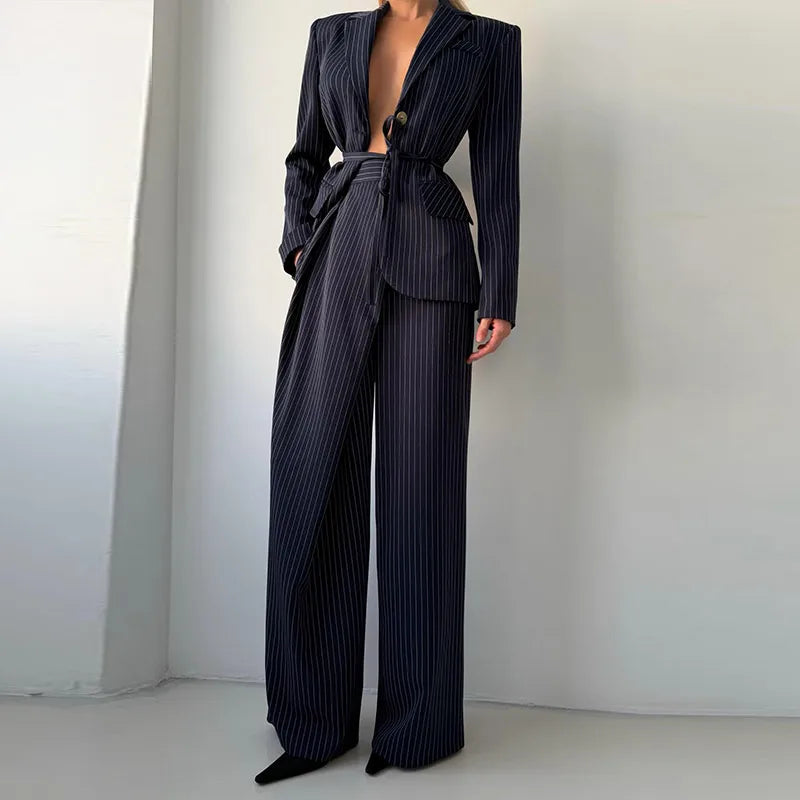 women’s pinstripe suit set, tailored blazer and trousers set, women’s professional suit, elegant blazer set for women, office wear suit set, business casual women outfit, women’s matching blazer trousers, luxury women’s suit, oversized pinstripe blazer, high waisted tailored trousers, chic women’s co ord set, modern power suit women, sophisticated women’s fashion, women’s formal outfit set, ladies business suit, fashionable women’s tailoring, classy women’s blazer set, trendy women’s suit set, smart casual 