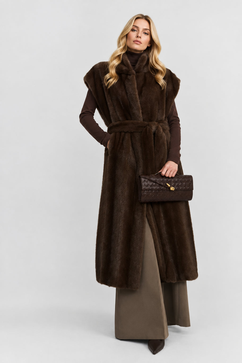 Women's sleeveless longline faux fur vest with belt