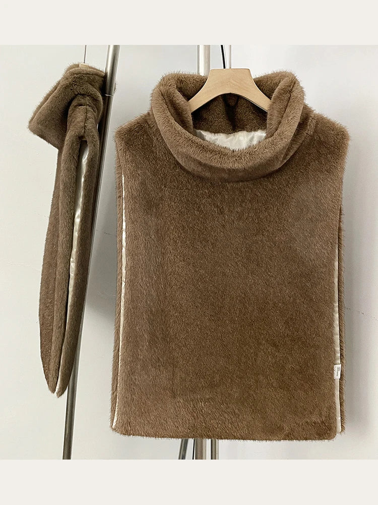 Women's faux fur vest in beige, front view

Women's plush faux fur vest with matching belt

Women's brown faux fur vest, sleeveless design

Women's faux fur vest with long front and short back

Close-up of plush faux fur vest texture

Women's faux fur vest styled with a long-sleeve top