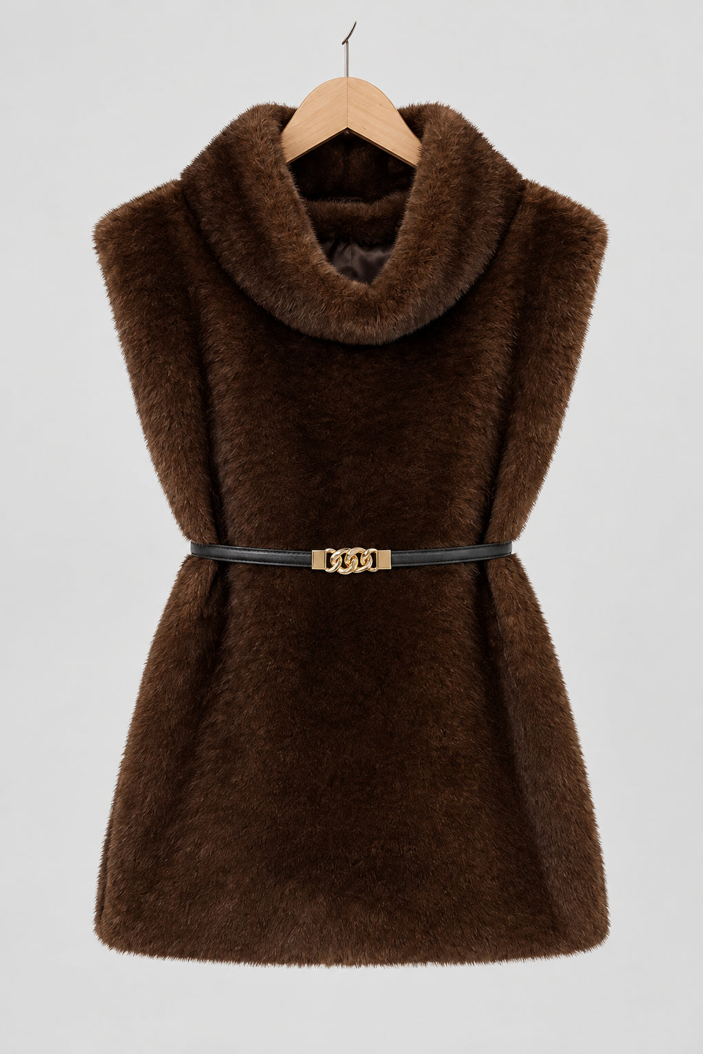 Women's faux fur vest in beige, front view

Women's plush faux fur vest with matching belt

Women's brown faux fur vest, sleeveless design

Women's faux fur vest with long front and short back

Close-up of plush faux fur vest texture

Women's faux fur vest styled with a long-sleeve top