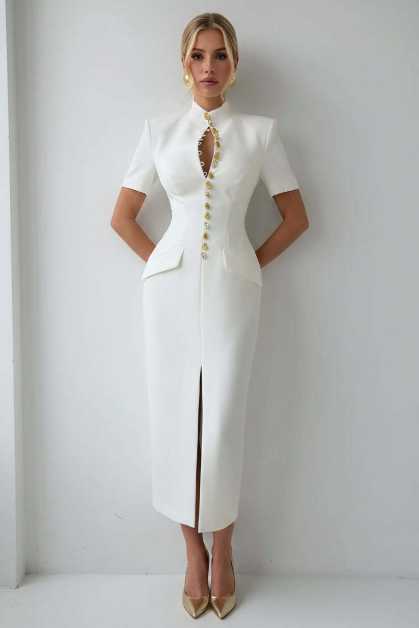 Floral midi dress features structured shoulders and a central button up closure reminiscent of former Blazer style.