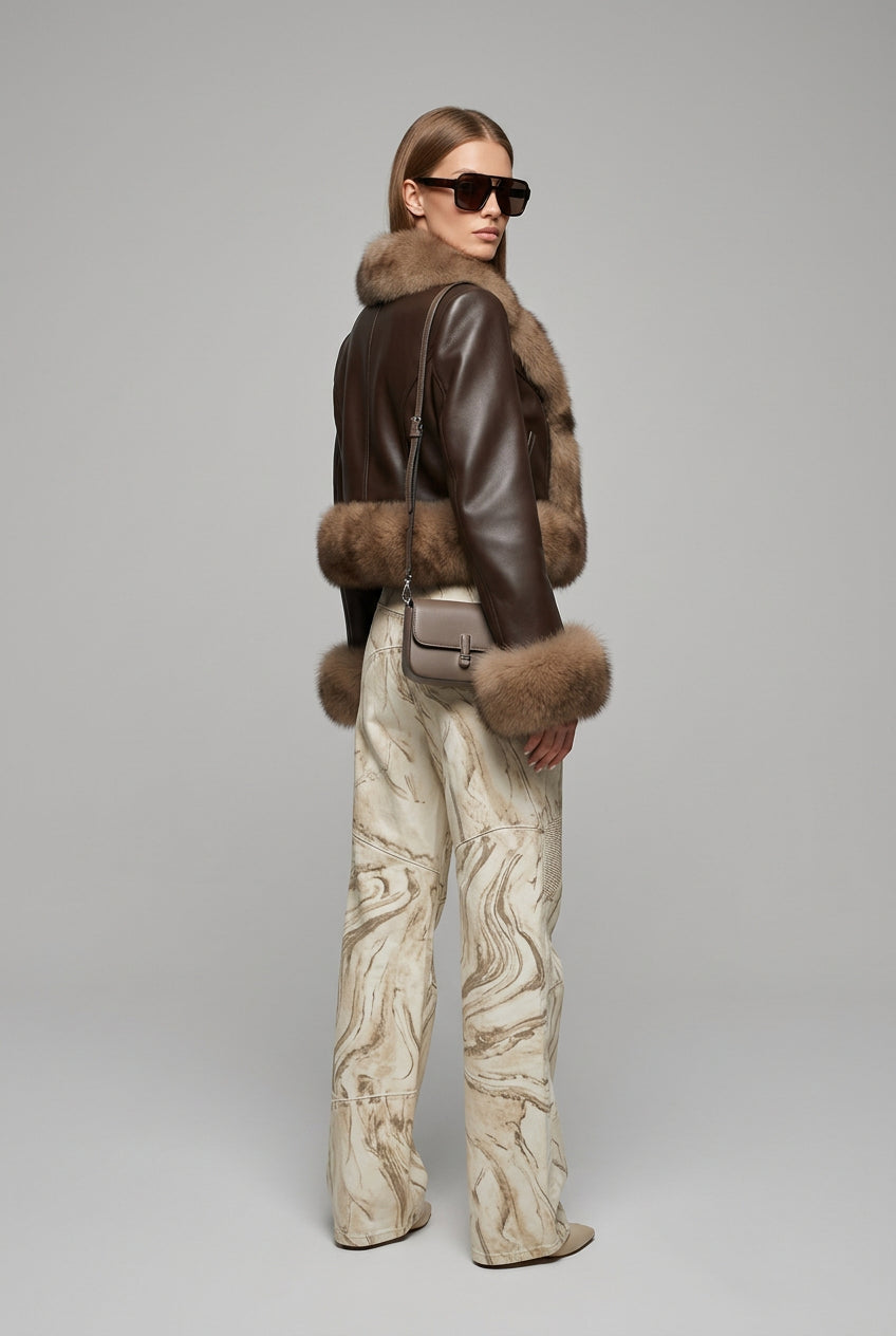 Textured panels on the women's faux fur patchwork jacket