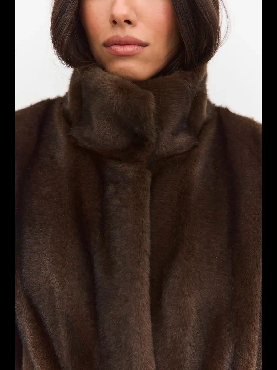 Longline sleeveless faux fur vest with a plush look