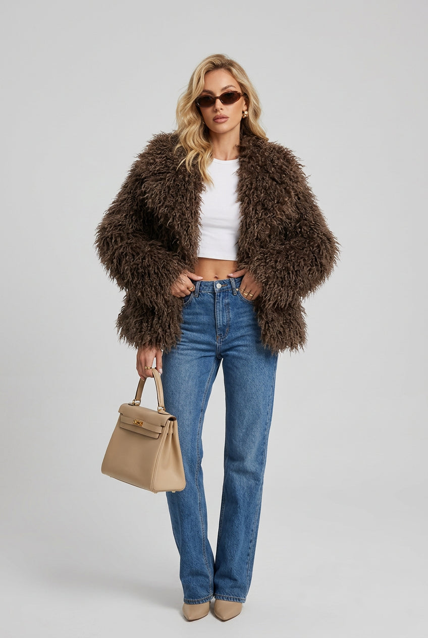 Plush faux fur coat with wide collar in a full front view