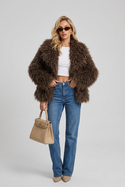 Plush faux fur coat with wide collar in a full front view