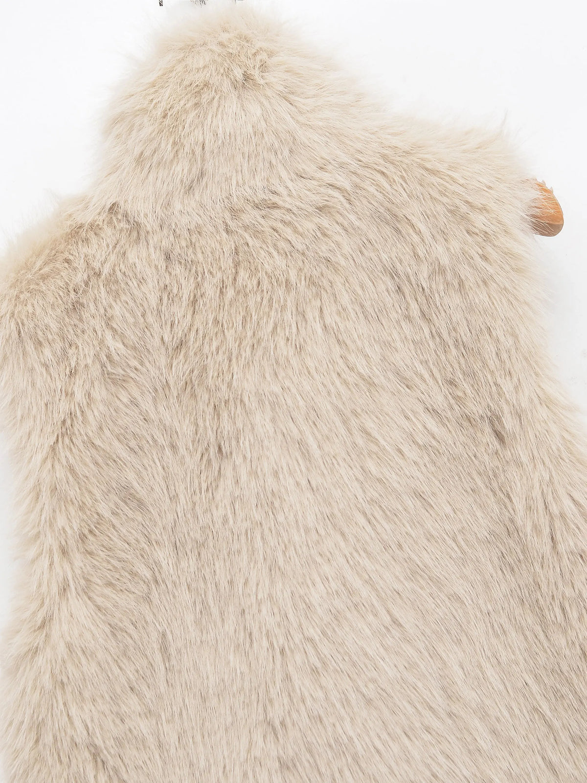 Close-up of the vest's plush faux fur finish
