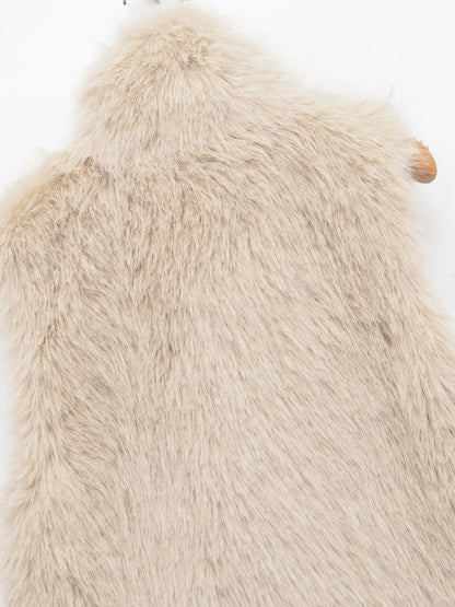 Close-up of the vest's plush faux fur finish