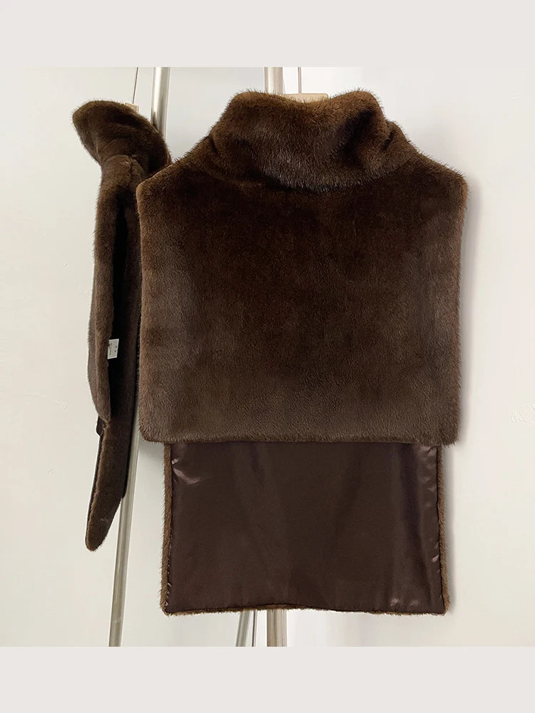 Women's faux fur vest in beige, front view

Women's plush faux fur vest with matching belt

Women's brown faux fur vest, sleeveless design

Women's faux fur vest with long front and short back

Close-up of plush faux fur vest texture

Women's faux fur vest styled with a long-sleeve top