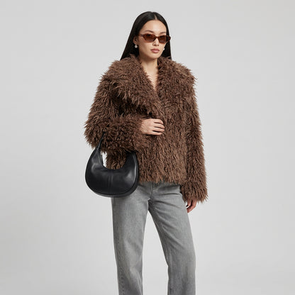 Plush faux fur coat showing its overall silhouette