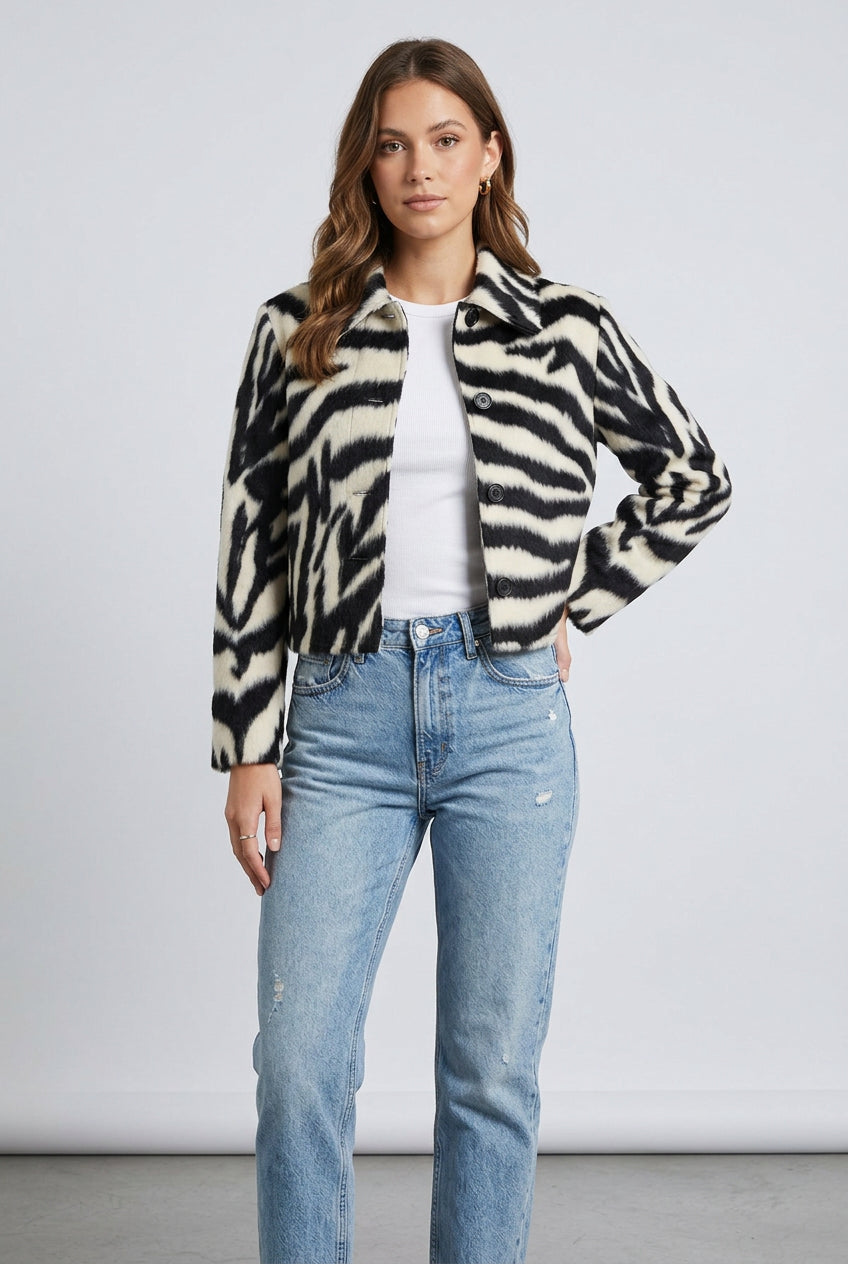 Women's cropped zebra-print faux fur jacket with a plush textured finish
