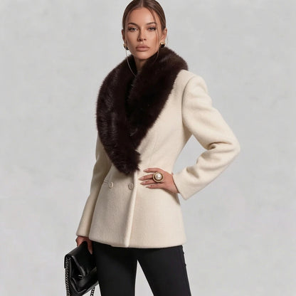 Beige tailored coat with long sleeves and structured waist detail