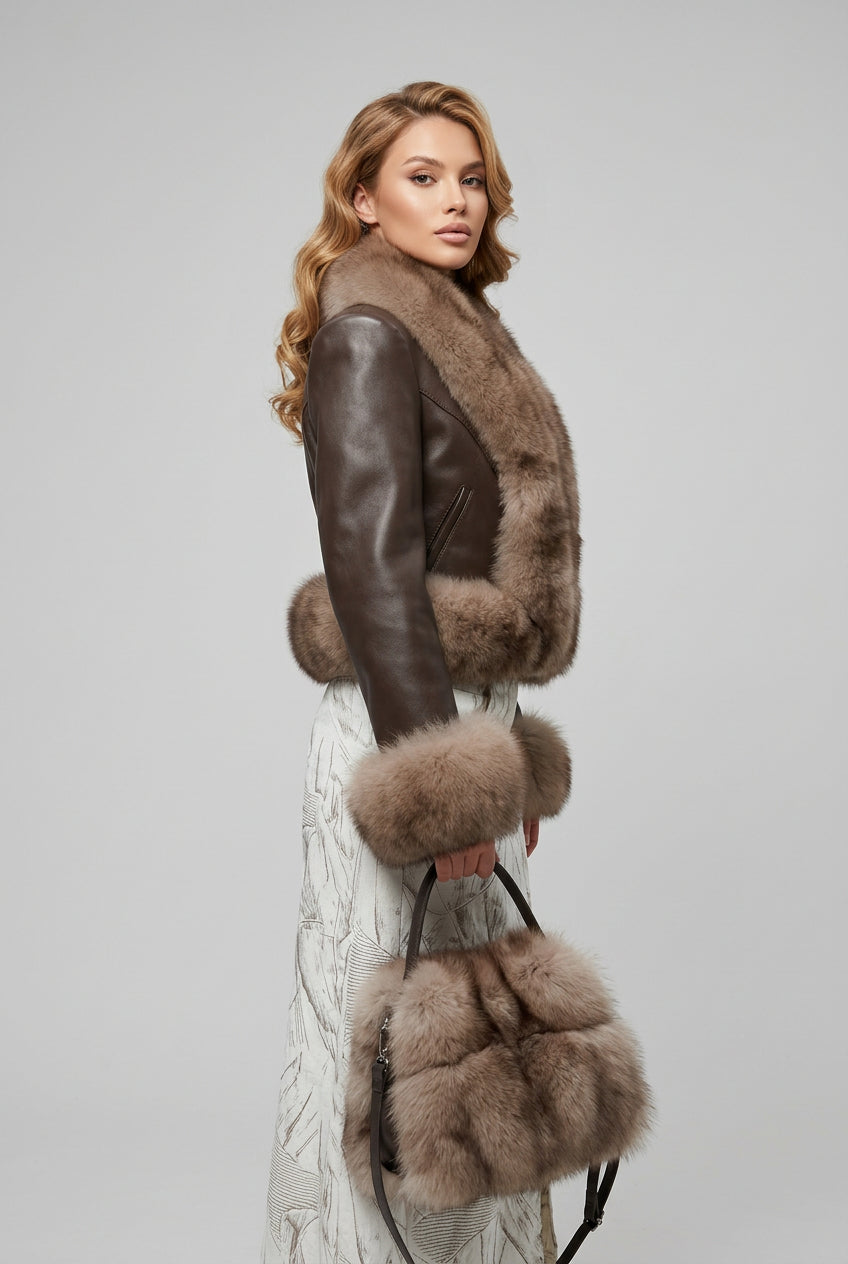 Faux fur patchwork jacket showing its cropped silhouette