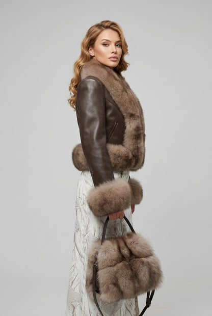 Faux fur patchwork jacket showing its cropped silhouette