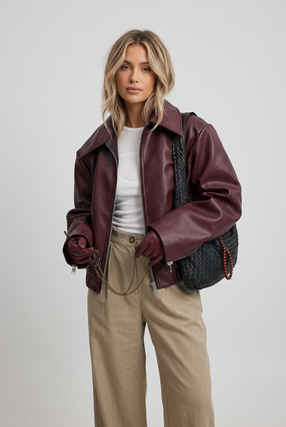 Wine red faux leather zip-up jacket front view
