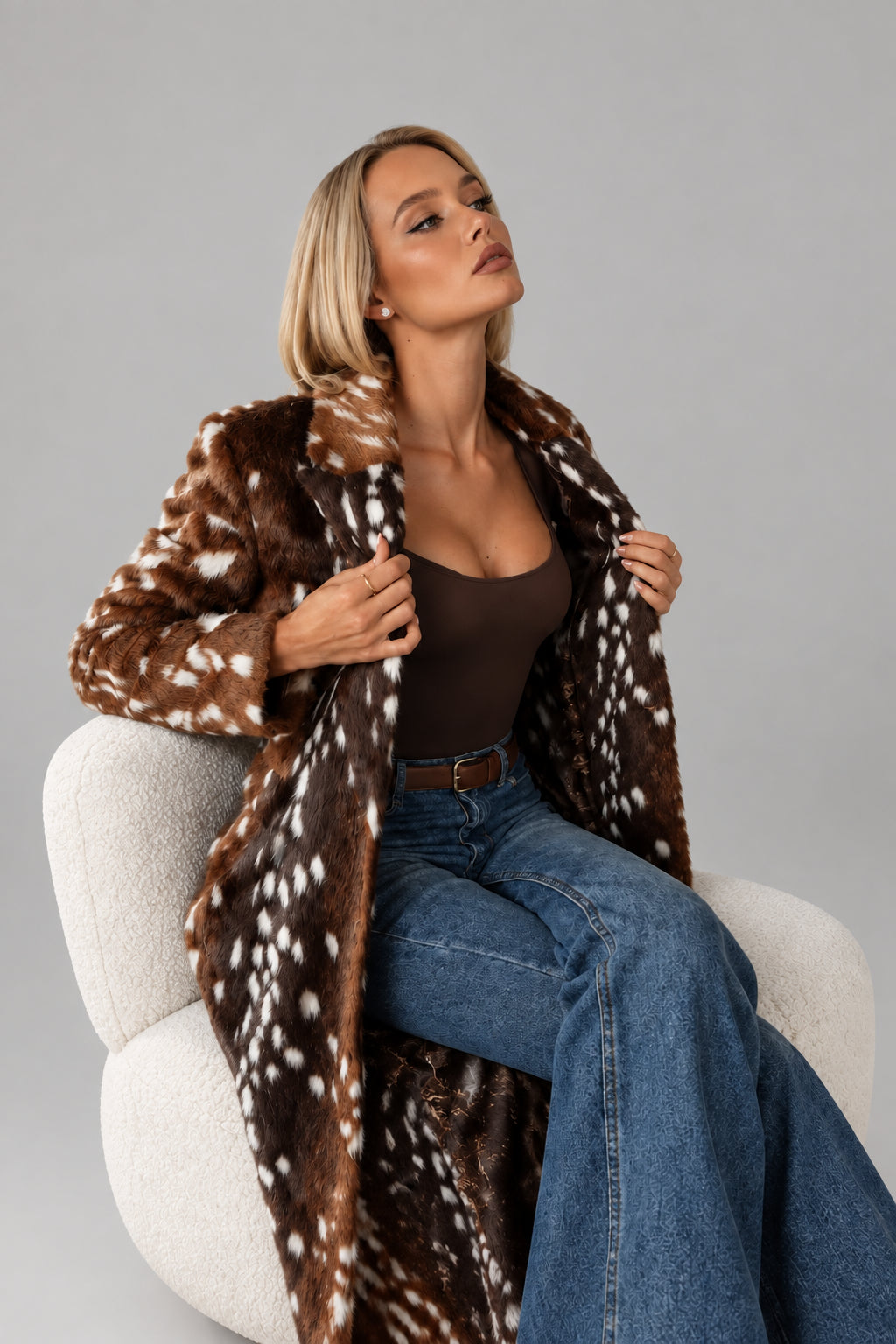 Brown deer print faux fur coat for women
Women's brown deer print faux fur coat front view
Long brown deer print faux fur coat with notched lapel
Women's oversized deer print faux fur coat
Brown faux fur coat with deer print and double-breasted front
Close-up of brown deer print faux fur coat texture
Women's long deer print faux fur coat styled for fall
Brown deer print faux fur coat back view
Side view of women's brown deer print faux fur coat
Model wearing brown deer print faux fur coat