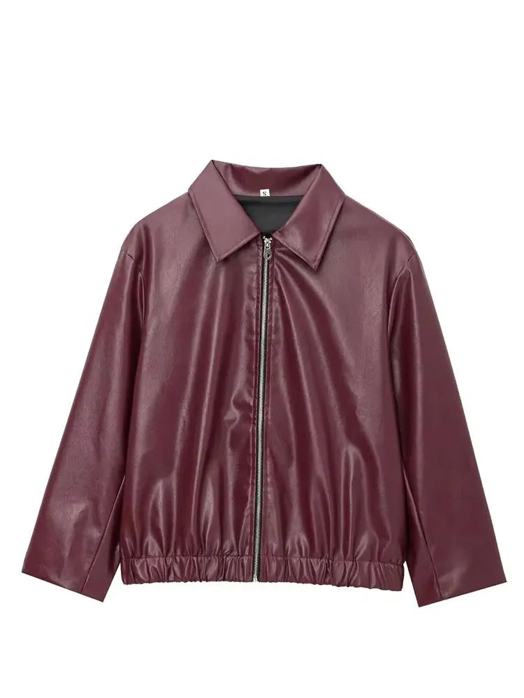 Wine red faux leather jacket styled on a model
